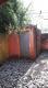 patio trasero con habitacción de guardado.jpg